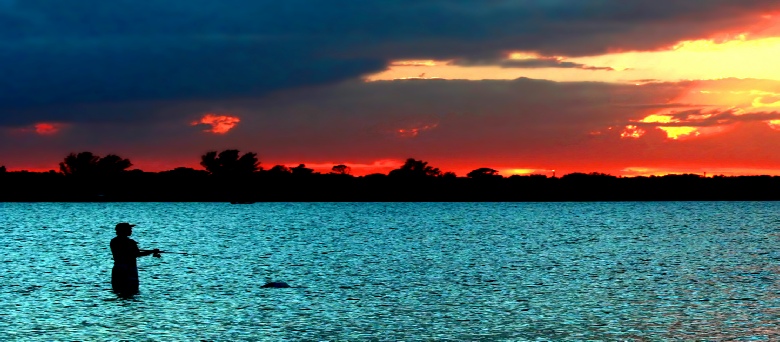 Fisherman at sunset in Lemon Bay, Englewood.